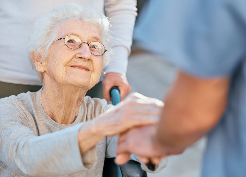 holding hands with a caregiver